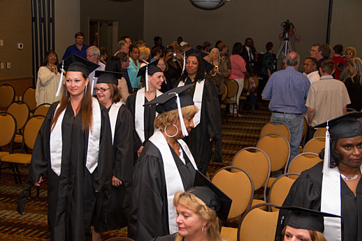 Masters Degree Graduates Filing In