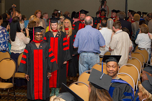 Doctoral Degree Graduates Filing In